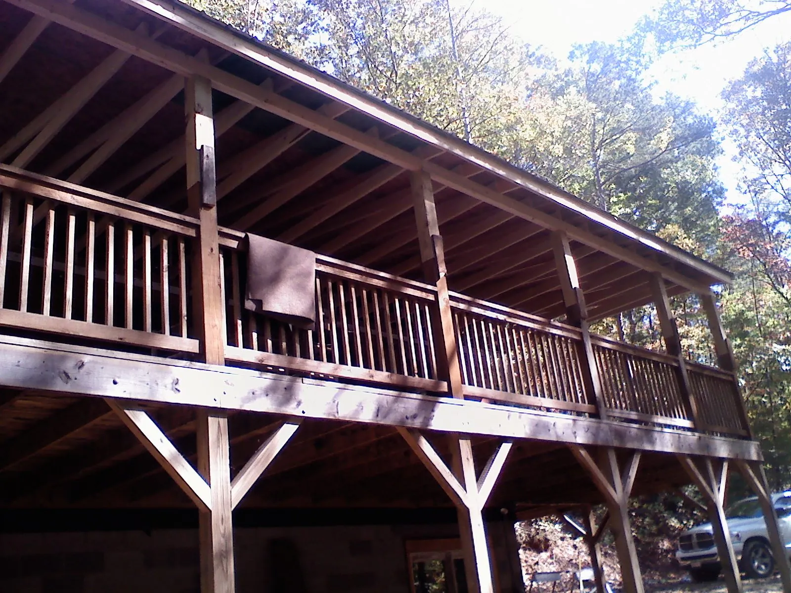 Timber framing under a new elevated porch and deck — Roof Leak Repair in Rowlett by Roofing Brothers